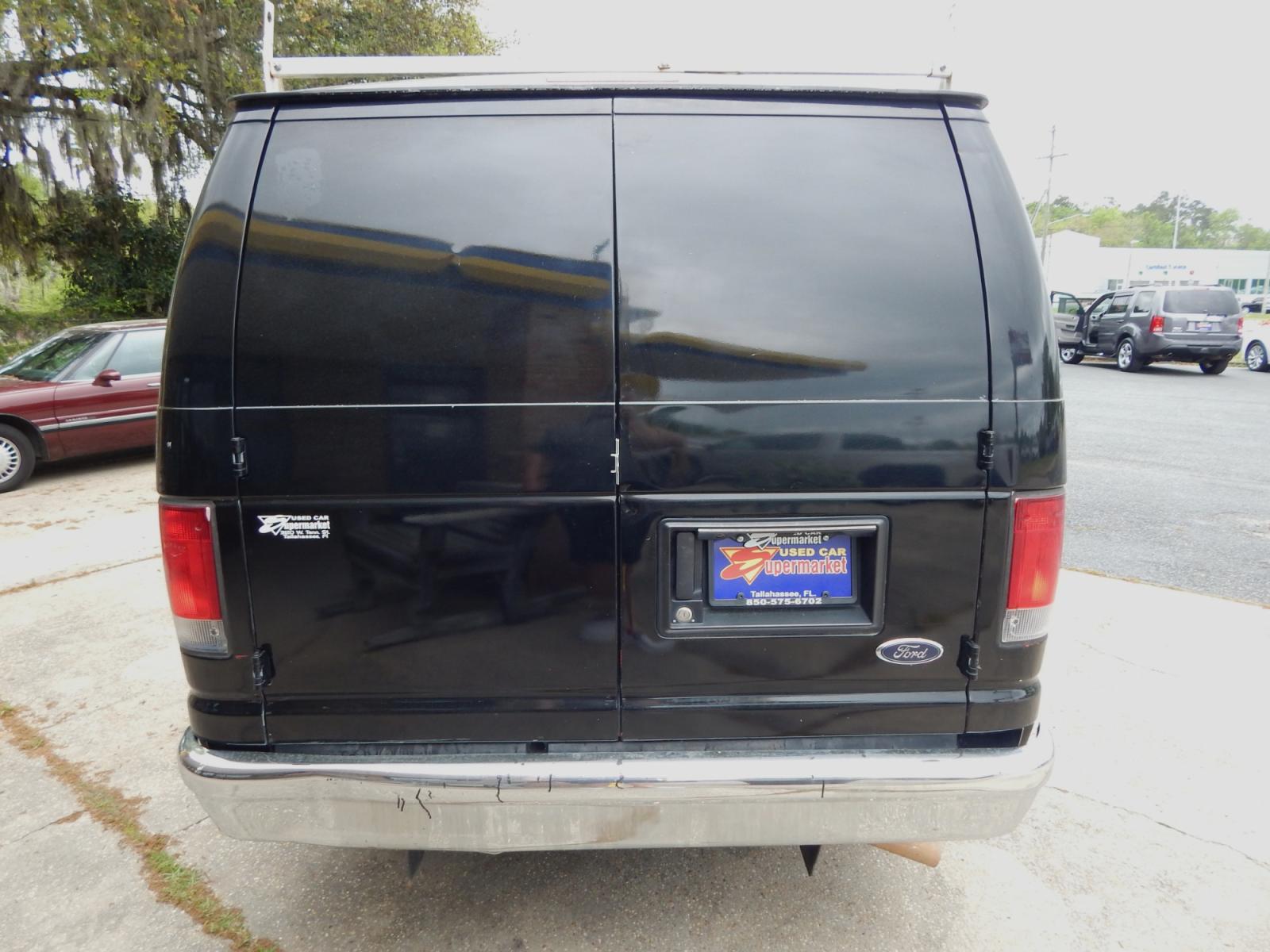 2014 Black Ford E-Series Van (1FTNE1EW6ED) with an V8 engine, Automatic transmission, located at 3120 W Tennessee St, Tallahassee, FL, 32304-1002, (850) 575-6702, 30.458841, -84.349648 - Used Car Supermarket is proud to present you with this loaded immaculate 2014 Ford E150 Econoline Work Van. Used Car Supermarket prides itself in offering you the finest pre-owned vehicle in Tallahassee. Used Car Supermarket has been locally family owned and operated for over 48 years. Our E150 Work - Photo #3